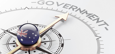 Stock image of a compass pointing to the word Government